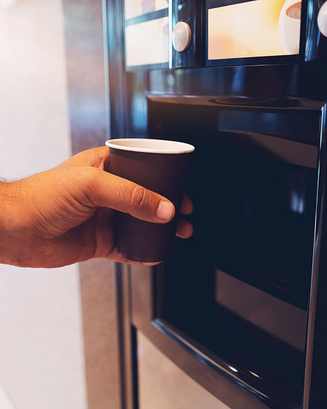 Man at coffee machine