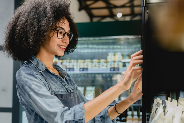 Woman using vending machine